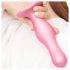 Strap-on-me Curvy M – Aaltomuotoinen Imukuppidildo (pinkki)
