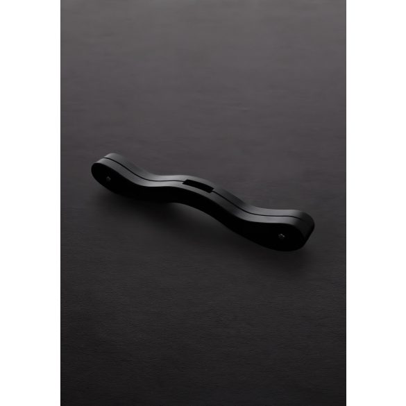 Musta puinen juomapyhätökkä